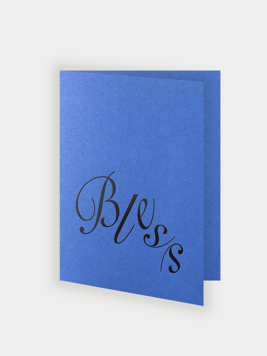 Blue card with 'Bless' text on a white background